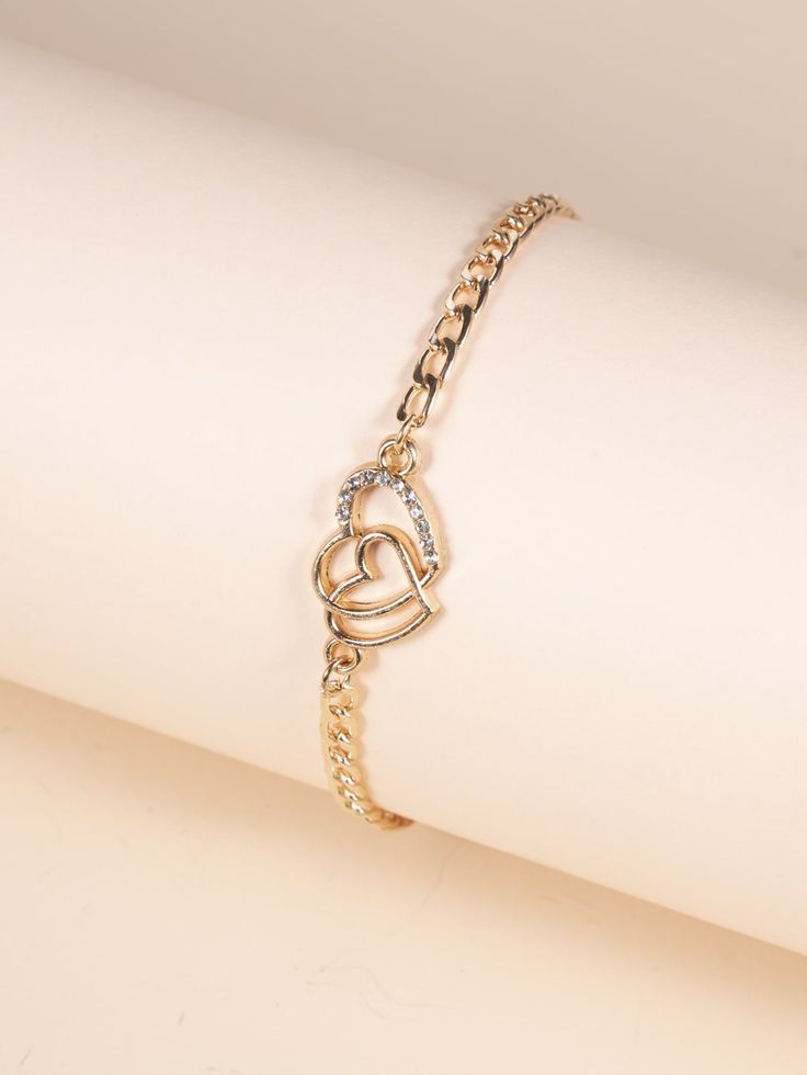 Pulseira de corrente dourada com corações entrelaçados cravejados